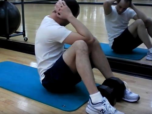 Sit-Ups Elbow to Knee Twist Image